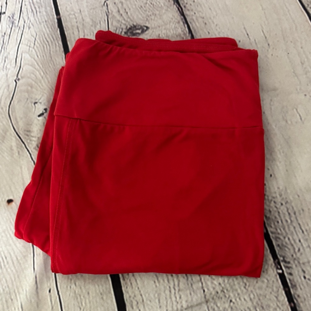 Worn once TC LuLaRoe Leggings holiday red like new buttery soft tall & curvy